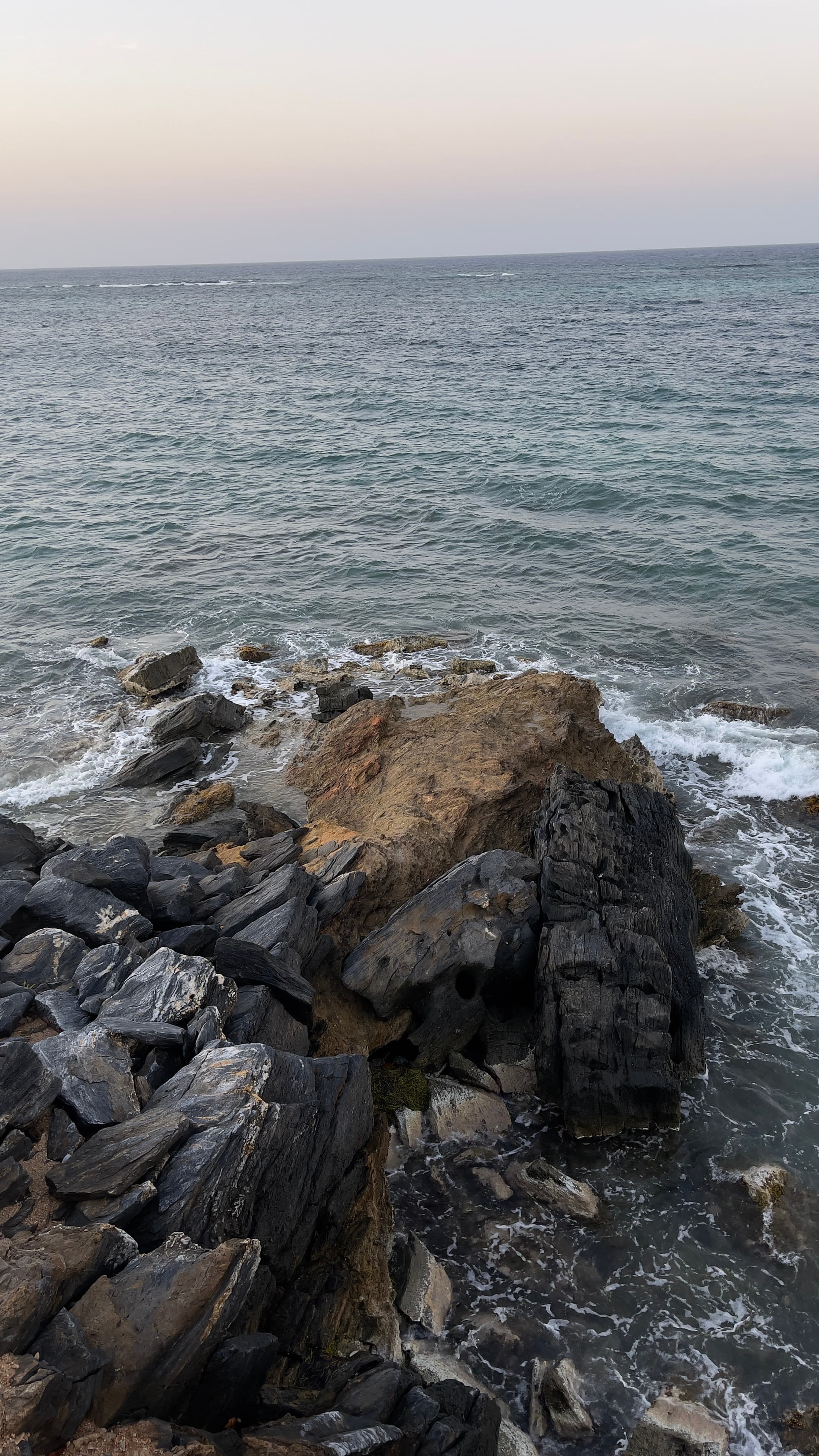 Rocky coastline at dusk